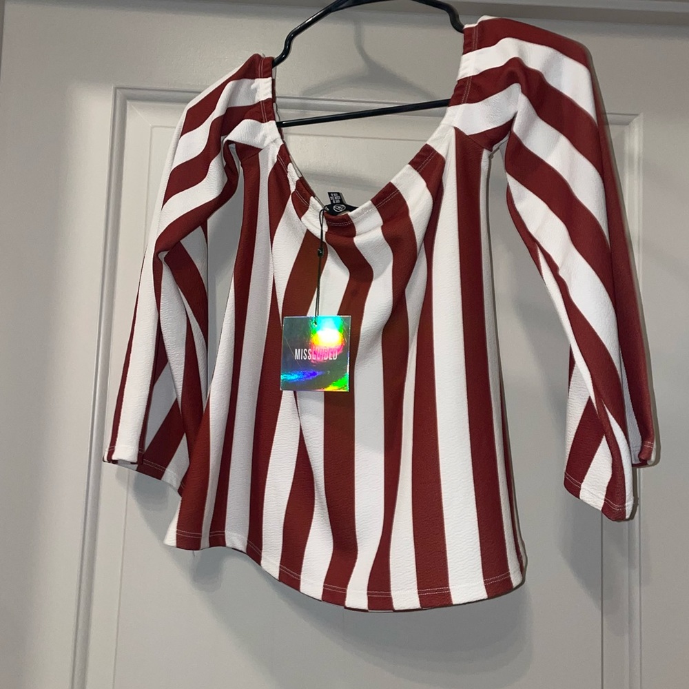 Long sleeve off the shoulder one piece from missguided. Brand new with tags. S